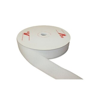 May include: A roll of white hook and loop tape, also known as Velcro, on a white cardboard spool. The tape is used for fastening and securing items.