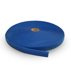 May include: A roll of blue hook and loop tape, also known as Velcro, is shown against a white background. The tape is rolled up and the end is hanging down.
