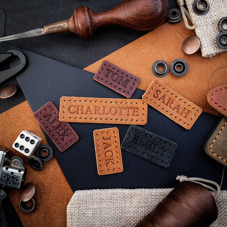 Beautiful small handmade leather label with neatly embossed personalisation. Leather colors include black, brown and tan. The perfect personalized leather tag to add an extra special touch to a thoughtful gift.