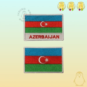 May include: Two embroidered patches of the Azerbaijani flag. The flag is blue, red, and green with a white star and crescent moon in the center. The top patch has the word "AZERBAIJAN" written below the flag.