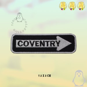 May include: Black and white embroidered patch with a white arrow pointing right and the text "COVENTRY" in white. The patch is 7.5 cm by 3 cm.