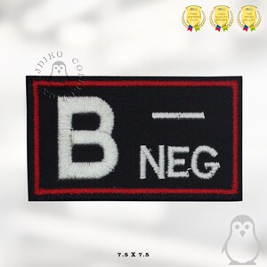 May include: A black embroidered patch with a white 'B' and 'NEG' in white lettering. The patch has a red border and measures 7.5 inches by 7.5 inches.