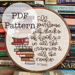 May include: A PDF pattern for an embroidery hoop art piece. The design features stacks of embroidered books in various colors, with the quote "Fill your house with stacks of books, in all the crannies & all the nooks" by Dr. Seuss.