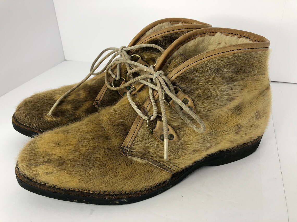 skin ankle boots