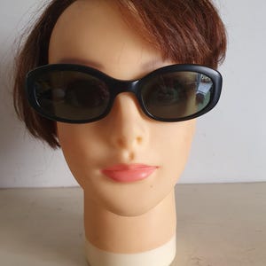 Vintage Trussardi Sunglasses with Sterling Silver Accents, 1980s Oval Shape, Black Frame and Green Lenses, Made in Italy