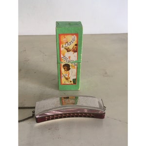 Signed &quot;Jazz Melody&quot;, Made in Germany Reg. No 417044 with Neck Chain Vintage Harmonica.