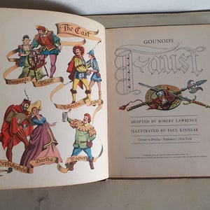 May include: An illustrated book cover for a children's adaptation of Gounod's opera Faust. The cover features a colorful cast of characters from the opera, including Faust, Marguerite, Mephistopheles, and Valentine. The title "Gounod's Faust" is written in a large, decorative font.