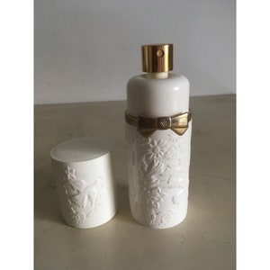 Nina Ricci Paris 50ml Collectible Vintage Bottle. 1980's Eau de Toilette Perfume. Embossed Flower & Birds Motif, White Plastic Case.