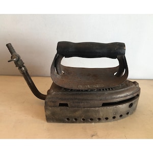 Vintage industrial gas-powered iron by W.M. Crane Co, New York. Rare heavy cast iron piece, circa early 1900s. Collectible condition.