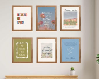 May include: Six framed art prints with inspirational quotes and Bible verses. The frames are brown, and the prints feature text and floral or landscape imagery. The text includes "Because He Lives," "We have peace," and "Isaiah 41:10."