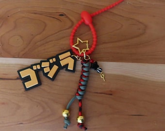 Kit de llaveros de Godzilla x Hello Kitty