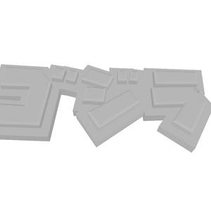 Puede incluir: Un objeto gris claro en tres dimensiones con la forma de los caracteres katakana japoneses para Godzilla. El diseño presenta letras en relieve con bordes geométricos afilados y un acabado de superficie mate, plano y uniforme en toda la pieza.
