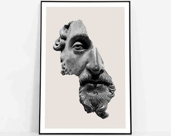 May include: A black and white photograph of a broken sculpture of a man's face. The sculpture is in a minimalist frame against a light beige background.