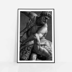 May include: Black and white photograph of a sculpture depicting two muscular men wrestling. The men are sculpted in a dynamic pose, with one man on top of the other. The sculpture is detailed and realistic, capturing the intensity of the struggle.