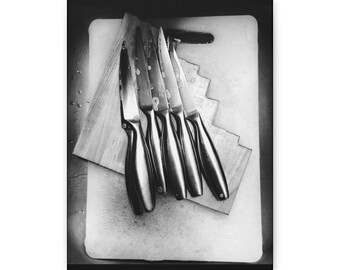 Lona con cuchillos de cocina vintage