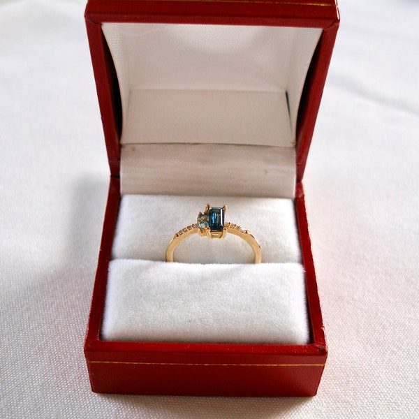 Whitehall - .54 Ct. Blue Topaz & Diamond  10k Yellow Gold Ring