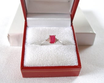 Celine F. - Ruby Solitaire & Diamond  10k White Gold Ring