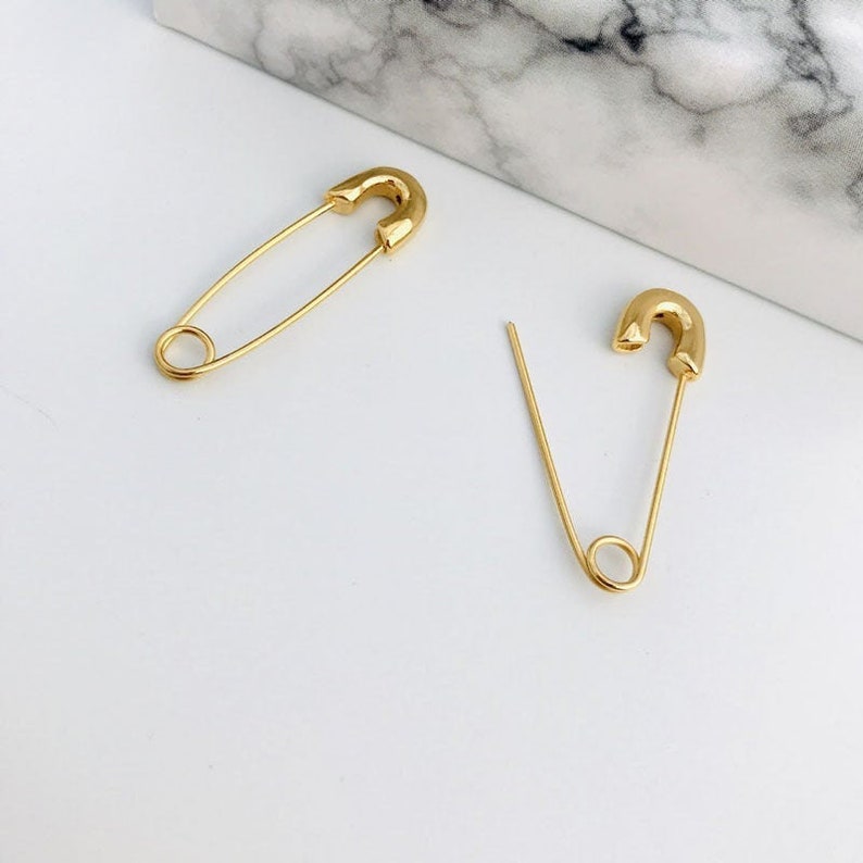 safety pin earrings expensive