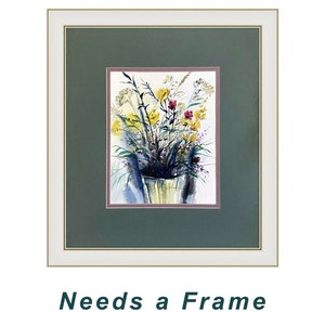 May include: A framed watercolor painting featuring a bouquet of yellow and red wildflowers in a vase. The artwork is set within a dark green mat and a white frame with gold trim. Below the image, the text reads "Needs a Frame" in dark green.