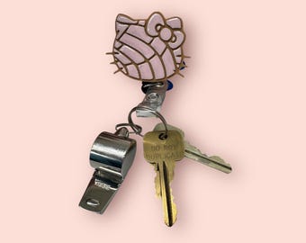 Hello Kitty Concha  Badge Reel