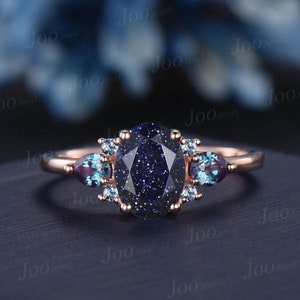 Oval Galaxy Blue Sandstone Alexandrite Ring Rose Gold Three Stone 