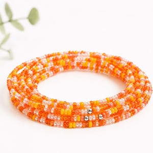 Set mit 8 orangefarbenen Perlenarmbändern, handgefertigter Boho-Schmuck zum Stapeln