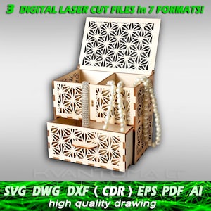 May include: A wooden jewelry box with a drawer and a lid. The box has a geometric pattern cut out of the wood. The lid is open and there are necklaces inside.