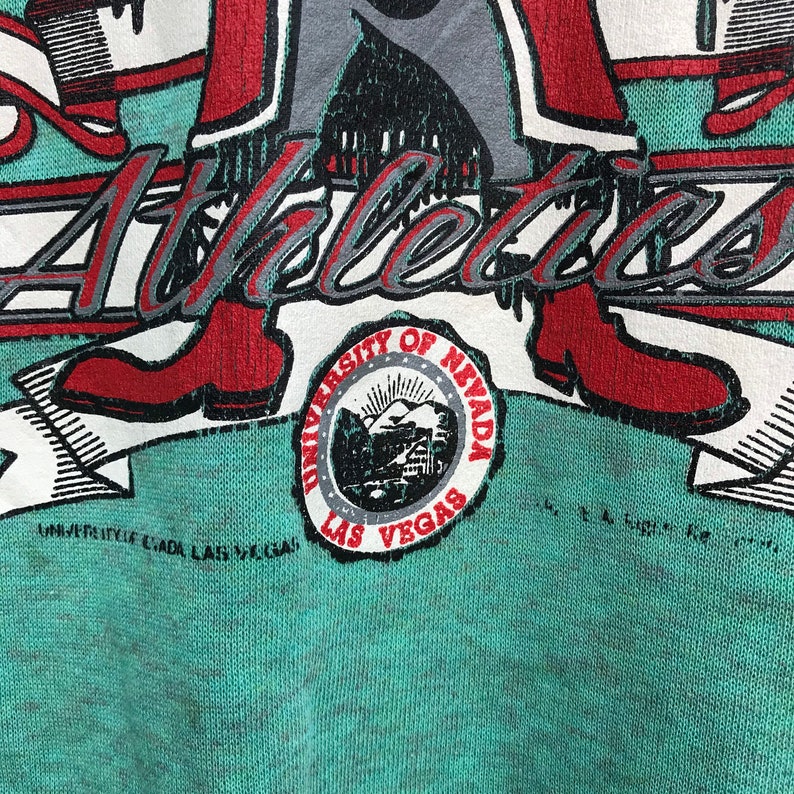 logo pullover jumper crewneck sweatshirtfashionstylerebelsunlv Pick Vintage 90\u2019s University Of Nevada Las Vegas big spellout HeyReb