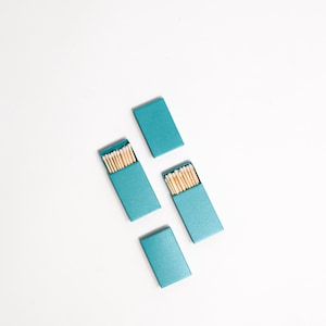 Iridescent Color Matchbox with White Wooden Matchsticks Iridescent Aqua