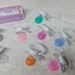 thumbnail image 2 of White And Pink Adult Pacifier – Fun Dummy By Dotty Diaper Company, Size L 2 of 6
