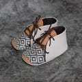 Wolfaby Leather Ethiopian baby booties, unisex habesha baby gift, newborn baby shoes, baby moc, baby moccasins, baby gift, baby shower gift. product logo