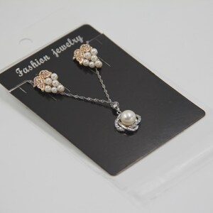 300x Black Display Card Cardboard 7x10cm Earring Pendant Chain Jewellery + 300x Plastic Bag