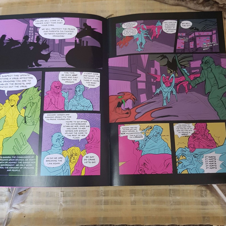 A double page spread of the comic. It features brightly coloured pannels dominated by pink and cyan. They show characters talking, and riding on dragon back.