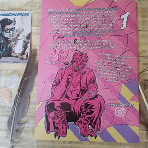 This picture contains the back cover of the comic. It features the main character Shimoko smoking, while his dragon roars behind him. The blurb surronds the duo.Both characters are coloured in neon pink.