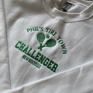 Sudadera unisex bordada Phil's Tire Town Challengers