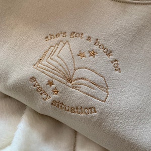 A Book For Every Situation Unisex Embroidered Sweatshirt