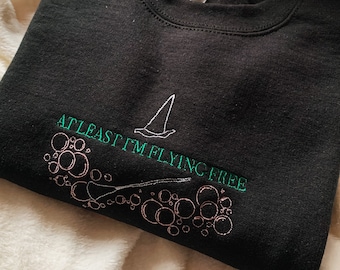 Wicked Flying Free Defying Gravity Unisex Embroidered Sweatshirt