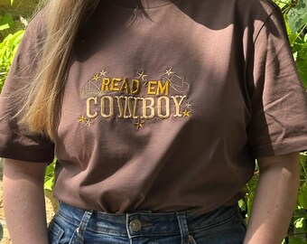 Read Em Cowboy Bookish Cowboy Romance Inspired Unisex Embroidered T Shirt