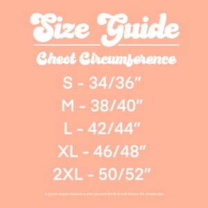 May include: Size guide for chest circumference in inches.  Sizes include S - 34/36", M - 38/40", L - 42/44", XL - 46/48", and 2XL - 50/52".  Text at the bottom reads: "If you're unsure measure a shirt you love the fit of and choose the closest size."