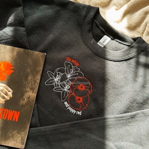 Lily White and Poppy Red Flowers Hadestown Unisex Embroidered Sweatshirt
