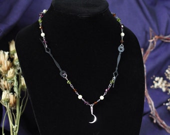 Unending - green, purple, brown, pearl beaded chain necklace with clock hands and sickle
