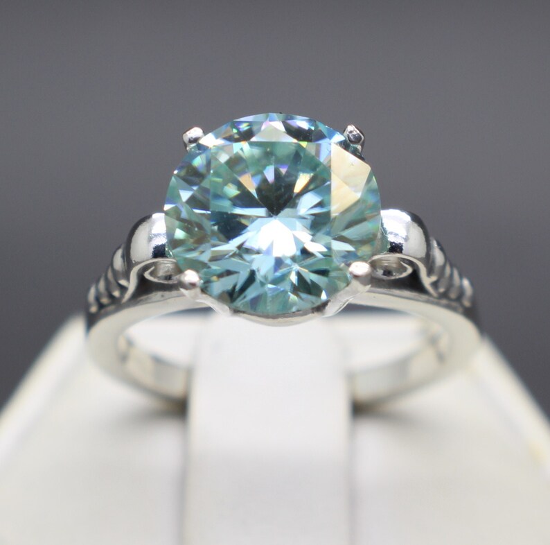 10.15mm VVS-1 Clarity Certified 3.60cts Ice Blue Diamond Scroll Ring