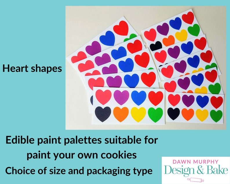 Puede incluir: Paletas de pintura comestibles con formas de coraz&oacute;n en varios colores, como rojo, azul, morado y amarillo. El texto dice "Heart shapes" y "Edible paint palettes suitable for paint your own cookies".