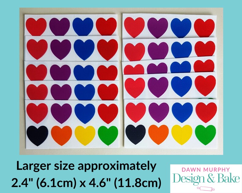 Puede incluir: Hojas de pegatinas rectangulares con corazones de colores rojo, morado, azul, naranja, amarillo, verde y negro. Las pegatinas miden aproximadamente 6,1 cm por 11,8 cm. La imagen incluye el texto "Larger size approximately" y la marca "Dawn Murphy Design & Bake."