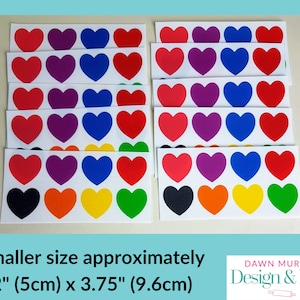 Puede incluir: Hojas de pegatinas con dise&ntilde;os de corazones coloridos en rojo, morado, azul, negro, naranja, amarillo y verde. Cada hoja tiene 12 corazones. El texto de la imagen dice "Smaller size approximately 2" (5cm) x 3.75" (9.6cm)".