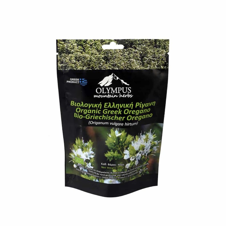 May include: A black resealable pouch with a white label featuring the text "OLYMPUS mountain herbs" and "Organic Greek Oregano". The pouch contains dried oregano and has a net weight of 40g.