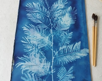 Cyanotype print on vintage paper.
