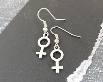 female gender symbol earrings