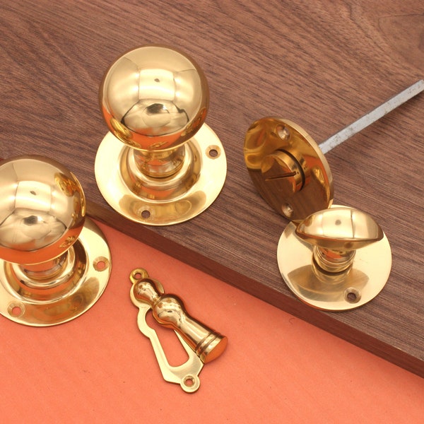 Round Ball Rim / Mortice door knob with Escutcheons / privacy - Polished Brass