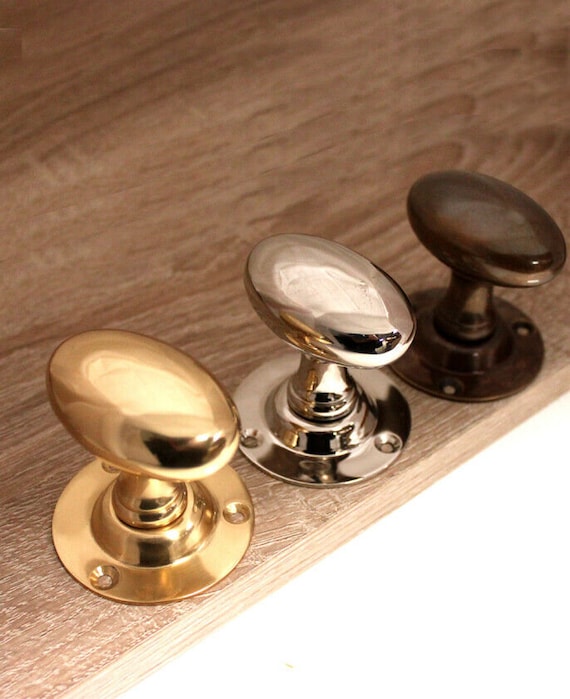 Designer Levers Oval Mortice Door Knob Pair Antique Brass 55mm